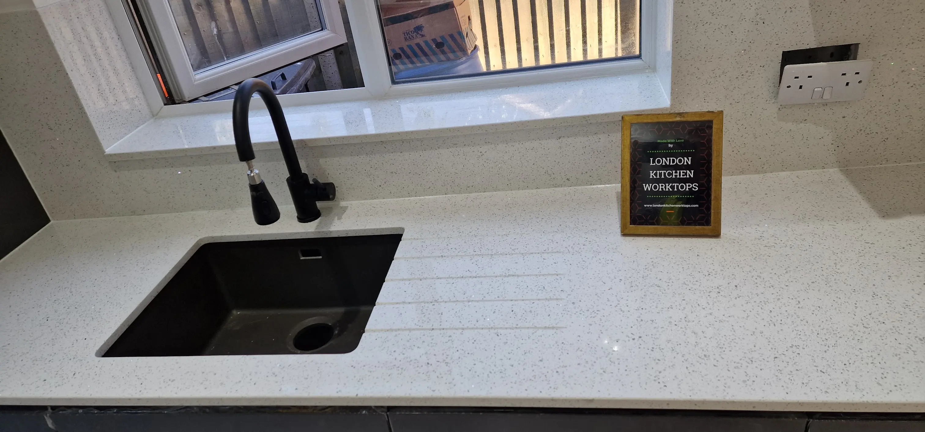 Quartz Sink Cut-Out Teddington Quartz worktop with undermount sink cut-out and drainer grooves in Teddington